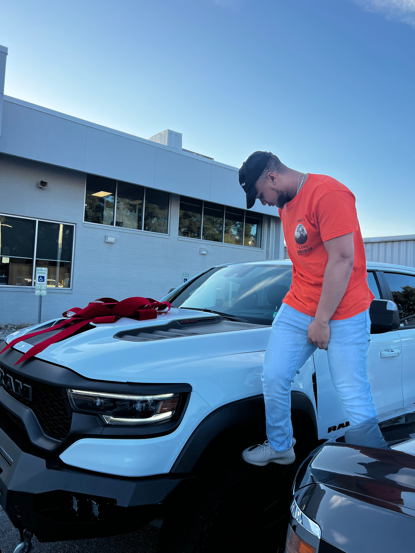 Taequez Davis picking up his RAM TRX truck